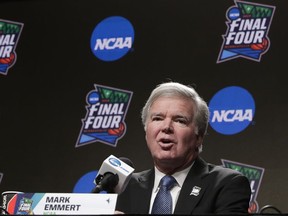 FILE - In this April 4, 2019, file photo, NCAA President Mark Emmert answers questions at a news conference at the Final Four college basketball tournament in Minneapolis. College athletes are continuing to function at high levels in the classroom but their Academic Progress Rate scores appear to be hitting a peak. The most recent statistics, released Wednesday, May 8, 2019, show this year's overall four-year score matched last year's record-high of 983 and that the four-year scores in football, men's basketball and women's basketball also matched last year's marks. Baseball improved by one point to 976 while single-year scores at Historically Black Colleges declined slightly. "We are seeing some flattening of rates, which is not unusual given the large amount of data over a long period of time," Emmert said in a statement.