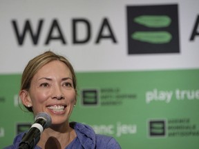 FILE - In this June 5, 2018, file photo, Beckie Scott speaks at a news conference following the World Anti-Doping Agency's first Global Athlete Forum in Calgary, Alberta. A law firm found no evidence that WADA members bullied Scott, though it concluded that one member's comments to her "could be viewed as aggressive, harsh or disrespectful." WADA released a 58-page report Wednesday night, May 15, 2019, that was conducted to determine whether Scott, the Canadian Olympic champion, was bullied at a contentious meeting last September when officials lifted the suspension of Russia's anti-doping agency over her protest.