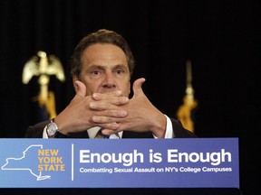 FILE - In this Tuesday, July 7, 2015 file photo, Gov. Andrew Cuomo speaks during a ceremony at New York University on the day he signed a bill into law that requires New York state's private colleges and universities to have a new, affirmative sexual consent policy to combat campus sexual violence. Just what constitutes an expression of consent is a hotly debated topic in the justice system and in society at large. And while there's been a gradual cultural trend, especially on university campuses, toward a standard of "affirmative consent" _ otherwise known as "yes means yes" rather than "no means no" _ the laws on sexual assault have not similarly evolved.