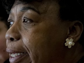 In this Wednesday May 8, 2019, photo, Gwen Carr, mother of Eric Garner, an unarmed black man who died as he was being subdued in a chokehold by NYPD police officer Daniel Pantaleo nearly five years ago, speaks during an interview in New York. A New York City judge has cleared the way for a police disciplinary trial to begin next week for Pantaleo in the death of her son, after rejecting his claim that a police watchdog agency didn't have jurisdiction to prosecute the case.