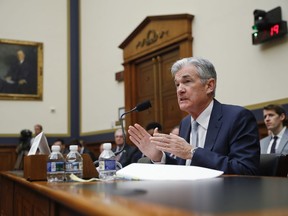 FILE- In this Feb. 27, 2019, file photo Federal Reserve Board Chair Jerome Powell gestures while speaking before the House Committee on Financial Services hearing on Capitol Hill in Washington. On Wednesday, May 1, the Federal Reserve releases its latest monetary policy statement after a two-day meeting.