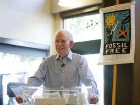 FILE - In this Sept. 10, 2018 file photo, Jeremy Grantham, co-founder of the Boston-based investment firm Grantham Mayo Van Otterloo (GMO), lays out the financial case for divestment at the Fossil Fuel Divestment State of the Movement event in San Francisco. Grantham, who correctly predicted the dot-com and housing bubble crashes, sees climate change investing offering decades of growth. His firm, GMO, launched a climate change fund in 2017.