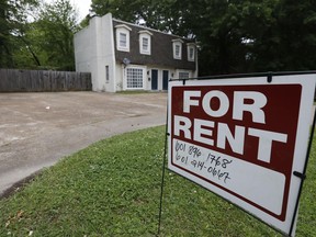 FILE - In this April 23, 2018, file photo a for rent sign denotes the availability of another existing home in Jackson, Miss. Buying a home is often seen as a no-brainer if you have the means. But continuing to rent can give you more flexibility, amenities and time. It can also give you a sense of financial security, since there's no down payment, repairs or closing costs to eat through your nest egg.