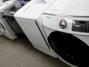 FILE - In this May 9, 2019, file photo washers and dryers are shown on display in a retail store in Cranberry Township, Pa. On Friday, May 24, the Commerce Department releases its March report on durable goods.