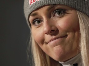 FILE - In this Feb. 10, 2019 file photo, United States' Lindsey Vonn gets emotional as she holds a press conference after taking the bronze medal in the women's downhill race, at the alpine ski World Championships in Are, Sweden. The retired alpine skiing champion, is ready to look back. Vonn's memoir "Rise: My Story" will come next year, Dey Street Books announced Monday, May 13. Vonn will describe her journey from childhood in Minnesota to international fame, her achievements - including 82 World Cup wins and three Olympic medals - and injuries ranging from fractures near her left knee joint to a broken arm. In a statement issued through Dey Street, Vonn said she was "digging deep" into her life.
