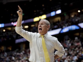 FILE - In this March 28, 2019 file photo, Michigan coach John Beilein shouts during the first half of the team's NCAA men's college basketball tournament West Region semifinal against Texas Tech in Anaheim, Calif. Cleveland has signed Beilein to a five-year contract, three people familiar with the decision told The Associated Press on Monday, May 13. The deal came together quickly in the past 24 hours and was finalized Sunday after the Cavs had spent the weekend in Denver interviewing several NBA assistants. The people spoke to The AP condition of anonymity because the team had not announced the hire.