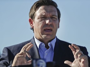 FILE - In this Jan. 29, 2019 file photo, Gov. Ron DeSantis speaks about his environmental budget at the Everglades Holiday Park during a new conference in Fort Lauderdale, Fla. Russian hackers gained access to voter databases in two Florida counties ahead of the 2016 presidential election, DeSantis said at a news conference Tuesday, May 14. DeSantis said the hackers didn't manipulate any data and the election results weren't compromised. He and officials from the Florida Department of Law Enforcement were briefed by the FBI and Department of Homeland Security on Friday, May 10.
