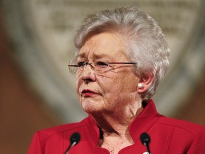 FILE- In this Jan. 9, 2018, file photo, Alabama Gov. Kay Ivey delivers the annual State of the State address at the Capitol in Montgomery, Ala. Ivey signed the nation's strictest abortion ban into law on Wednesday, May 15, 2019, making performing an abortion a felony in nearly all cases, punishable by up to life in prison, and with no exceptions for rape and incest.