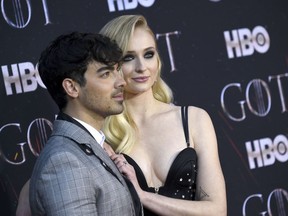 FILE - In this April 3, 2019 file photo, Joe Jonas, left, and Sophie Turner attend HBO's "Game of Thrones" final season premiere at Radio City Music Hall in New York. The couple have gotten married in a surprise ceremony in Las Vegas. It happened Wednesday night, May 1 after the Billboard Music Awards, where the Jonas Brothers had performed. Turner's publicist confirmed the nuptials, which DJ Diplo posted on his Instagram live feed.