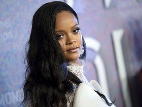 FILE - In this Sept. 13, 2018 file photo, singer Rihanna attends the 4th annual Diamond Ball at Cipriani Wall Street in New York. Rihanna is partnering with LVMH Moët Hennessy Louis Vuitton to launch a new fashion label. The pop star, born Robyn Rihanna Fenty, announced Friday, May 10, 2019, that a new line called Fenty will debut this spring and will be based in Paris.