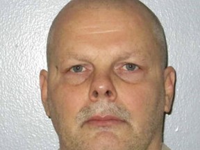 This Feb. 27, 2017 booking photo provided by the South Carolina Department of Corrections shows William Tillman. Tillman, a South Carolina prisoner already convicted of killing someone behind bars, has been charged with murder in the death of his cellmate last month. Arrest warrants say Tillman kicked Carl Pollen Jr. several times in the head, then strangled him with a bed sheet on April 29, 2019,  at Perry Correctional Institute near Pelzer, S.C. (South Carolina Department of Corrections via AP)