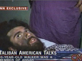 FILE - In this file image taken from video broadcast Dec. 19, 2001,  John Walker Lindh is seen during an interview soon after his capture. According to CNN, the interview took place Dec. 2, 2001. Lindh, the young Californian who became known as the American Taliban after he was captured by U.S. forces in the invasion of Afghanistan in late 2001, is set to go free Thursday, May 23, 2019, after nearly two decades in prison. (CNN via AP, File)