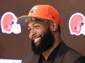 FILE - In this April 1, 2019, file photo, Cleveland Browns' Odell Beckham answers questions during an NFL football news conference in Berea, Ohio. The star wide receiver reported to the team's headquarters Monday and is on the field Tuesday, May 14, 2019, for practice.