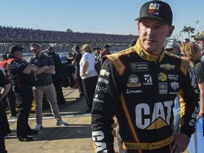 FILE - In this April 27, 2019, file photo, driver Daniel Hemric awaits the final round of qualifying for the NASCAR Cup Series auto race at Talladega Superspeedway in Talladega, Ala. Hemric grew up just up the road from Charlotte Motor Speedway. Now the Cup Series rookie is looking to race his way into the All-Star race and have a solid showing next week at the Coca-Cola 600 at his home track.