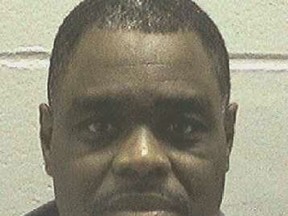 FILE - This undated file photo made available by the Georgia Department of Correction shows Scotty Garnell Morrow, who is set to die Thursday, May 2, 2019. When Morrow killed his ex-girlfriend and her friend nearly 25 years ago, his actions were spontaneous and emotionally fueled and shouldn't be punished by death, his lawyers argue. The State Board of Pardons and Paroles has scheduled a clemency hearing for Wednesday, May 1, 2019, and on Tuesday released a declassified clemency application submitted by Morrow's lawyers. (Georgia Department of Corrections via AP)