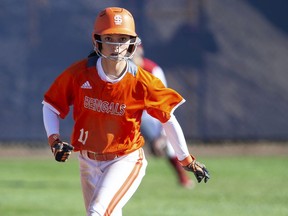 FILE - In this Feb. 8, 2019, file photo, Idaho State's Haley Harrison leads off second base during an NCAA softball game in Fullerton, Calif. Harrison was taught all her life to be mentally strong, never show any weakness. It helped the Idaho State senior on the softball field, but wreaked havoc on her mind as she struggled with mental illness.