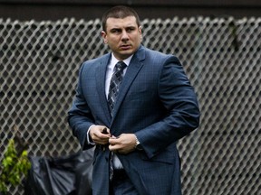 New York City police officer Daniel Pantaleo leaves his house Monday, May 13, 2019, in Staten Island, N.Y. A long-delayed disciplinary trial began Monday for Pantaleo, accused of using a banned chokehold in the July 2014 death of Eric Garner.