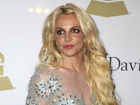 FILE - This Feb. 11, 2017 file photo shows Britney Spears at the Clive Davis and The Recording Academy Pre-Grammy Gala in Beverly Hills, Calif. A Los Angeles courtroom has been cleared of media and other audience members at a hearing on a restraining order taken out by Britney Spears against Sam Lutfi. The hearing was to seek an extension of a temporary restraining order against Lutfi, a former confidante who has been in legal battles with the family for years. Lutfi argued in documents that the order's restraint of his speech was unconstitutional.