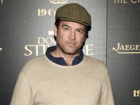 FILE - In this Nov. 1, 2016 file photo, Michael Weatherly attends a special screening of "Doctor Strange" at AMC Empire 25 in New York. CBS is defending its handling of a sexual harassment by Weatherly, star of the drama series "Bull." CBS Entertainment President Kelly Kahl said Wednesday that Weatherly "owned" his mistake and was apologetic and remorseful. Last year, CBS reached a $9.5 million confidential settlement with actress Eliza Dushku after she alleged on-set sexual comments from Weatherly made her uncomfortable.