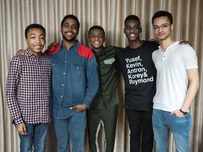 This May 20, 2019 photo shows Asante Blackk, from left, Jharrel Jerome, Caleel Harris, Ethan Herisse, and Marquis Rodriguez posing at the Mandarin Oriental Hotel in New York to promote their Netflix show "When They See Us."