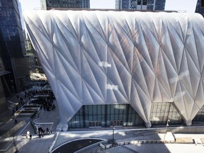 FILE - This April 1, 2019 file photo shows The Shed, the latest addition to Hudson Yards, in New York. The building is a new arts space consisting of a stationary building with a a shell constructed around it that can move in a matter of minutes to cover the adjacent public plaza and create an additional 120-foot-high giant room.