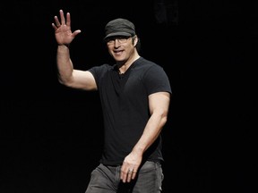 FILE - This April 26, 2018 file photo shows director Robert Rodriguez waving to the audience during the 20th Century Fox presentation at CinemaCon 2018 in Las Vegas. Cirque du Soleil is planning a new live show for the Las Vegas Strip this fall, written by Rodriguez.