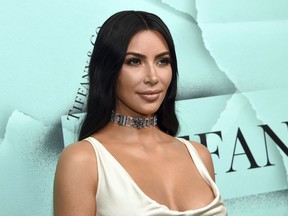 FILE - This Oct. 9, 2018 file photo shows Kim Kardashian West at the Tiffany & Co. 2018 Blue Book Collection: The Four Seasons of Tiffany celebration in New York. Oxygen Media said Tuesday, May 7, 2019, that it has greenlighted a two-hour documentary that will capture Kardashian West's efforts to free prisoners she believes were wrongly accused of crimes.