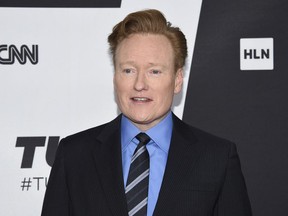 FILE - This May 16, 2018 file photo shows Conan O'Brien at the Turner Networks 2018 Upfront in New York.  O'Brien has agreed to settle a lawsuit with a writer who says the talk-show host stole jokes from his Twitter feed and blog for O'Brien's monologue on "Conan."