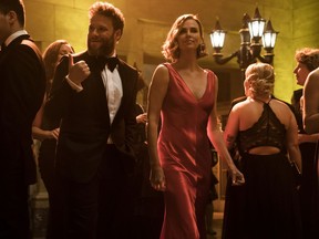 This image released by Lionsgate shows Seth Rogen, left, and Charlize Theron in a scene from "Long Shot."