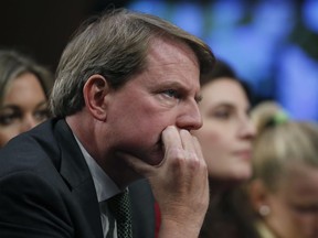 FILE - In this Sept. 6, 2018, file photo, White House counsel Don McGahn listens as President Donald Trump's Supreme Court nominee, Brett Kavanaugh testifies before the Senate Judiciary Committee on Capitol Hill in Washington. A House Judiciary Committee hearing will again be missing its star witness after the White House stepped in. The Democratic-led committee subpoenaed former White House counsel McGahn to appear for the hearing session Tuesday, May 21, but President Donald Trump on Monday directed McGahn to defy the subpoena.