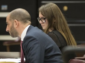 FILE - In this April 25, 2019, file photo, Anna Sorokin, right, and her lawyer Todd Spodek react as the jury foreman reads the verdict in New York. Spodek, a fake German heiress who swindled tens of thousands of dollars from New York banks and hotels, is set to learn her punishment. She faces sentencing Thursday, May 9, in Manhattan state court following her conviction for theft of services and grand larceny.