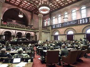 Members of the New York state Assembly vote on legislation that authorizes state tax officials to release, if requested, individual New York state tax returns to Congress, during a session in the Assembly Chamber at the state Capitol, Wednesday, May 22, 2019, in Albany, N.Y.