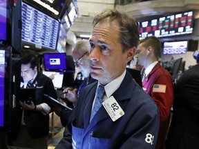 FILE - In this May 23, 2019, file photo trader Dudley Devine works on the floor of the New York Stock Exchange. The U.S. stock market opens at 9:30 a.m. EDT on Thursday, May 30.