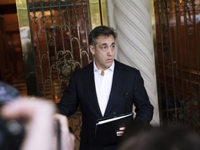 Michael Cohen, former attorney to President Donald Trump, holds a press conference outside his apartment building before departing to begin his prison term Monday, May 6, 2019, in New York.