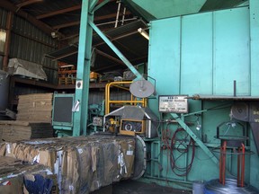 This 2006 photo provide by the Institute of Scrap Recycling Industries shows recently baled cardboard in Vancouver, British Columbia, awaiting shipping to a paper mill. Recycling systems are facing challenges in many places, but some experts say it's still growing. And they say dual-stream recycling _ in which you separate recyclables before they're collected _ is hitting its stride. (Institute of Scrap Recycling Industries via AP)