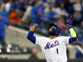 New York Mets' Amed Rosario celebrates after hitting a grand slam during the first inning of the team's baseball game against the Miami Marlins on Friday, May 10, 2019, in New York.