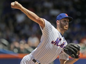 New York Mets starting pitcher Zack Wheeler throws during the first inning of a baseball game against the Detroit Tigers at Citi Field, Sunday, May 26, 2019, in New York.