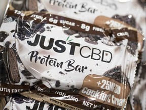 A cookies and cream flavored protein bar marketed by JustCBD is displayed at the Cannabis World Congress & Business Exposition trade show, Thursday, May 30, 2019 in New York.