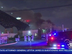 CORRECTS TO MAY, NOT JUNE - In this May 17, 2019 image made from video provided by WCBS TV, smoke billows over the Pulaski Skyway from a fire at the Alden Leads chlorine plant in Kearny, N.Y. Authorities say the fire has been brought under control, but road and bridge closures remained in effect and local residents were urged to remain indoors due to potential danger from fumes. (WCBS TV via AP)