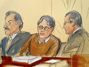 In this courtroom drawing, defendant Keith Raniere, center, is seated between his attorneys Paul DerOhannesian, left, and Marc Agnifilo during the first day of his sex trafficking trial, Tuesday, May 7, 2019. Raniere, the former leader of the self help group called NXIVM, has pleaded not guilty to the charges that he turned his followers into sex slaves.