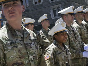 In this May 22, 2019 photo Briana Love, center, and fellow underclassmen prepare to drill at the U.S. Military Academy in West Point, N.Y. The class graduating on Saturday, May 25,  will include 223 women, the largest number since the first female cadets graduated in 1980. It will include 117 African-Americans, more than double the number from 2013, and the largest number of Hispanics, 88.