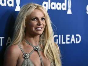 FILE - This April 12, 2018, file photo shows Britney Spears at the 29th annual GLAAD Media Awards in Beverly Hills, Calif. A Los Angeles judge will consider whether to extend a temporary restraining order Tuesday, May 28, 2019, that keeps Sam Lutfi, a former associate of Spears, away from her and her family.