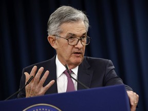 FILE - In this Wednesday, May 1, 2019, file photo, Federal Reserve Board Chair Jerome Powell speaks at a news conference following a two-day meeting of the Federal Open Market Committee, in Washington. Powell says a sharp rise in corporate debt is being closely monitored but currently the Fed does not see the types of threats that triggered the 2008 financial crisis.