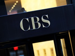 FILE - This Thursday, Dec. 6, 2018, file photo shows the CBS logo at the entrance to its headquarters, in New York. CBS is unveiling its fall 2019 prime-time schedule on Wednesday, May 15, 2019, and will host a presentation to advertisers with some of its top talent describing their newest shows.