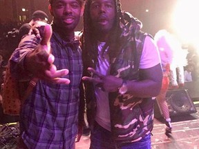 This undated photograph provided by Demetrius Nash shows Nash, left, with his friend Zack Stoner, who was killed at age 30 in a drive-by shooting in Chicago on May 30, 2018. Stoner was a pioneer in a new field of video journalism in which reporters go into high-crime areas to interview street-gang members and rappers. His killing unnerved fellow gangland reporters across the country, and exposed an ominous side to the genre of newsgathering Stoner called "'hood CNN." Police have made no arrests in his killing. (Courtesy of Demetrius Nash via AP)