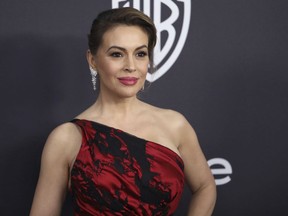 FILE - In this Jan. 6, 2019 file photo, Alyssa Milano arrives at the InStyle and Warner Bros. Golden Globes afterparty at the Beverly Hilton Hotel in Beverly Hills, Calif.