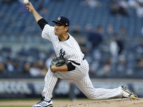 New York Yankees starting pitcher Masahiro Tanaka delivers during the first inning of the team's baseball game against the Seattle Mariners, Tuesday, May 7, 2019, in New York.