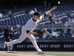 New York Yankees' J.A. Happ delivers a pitch during the first inning of a baseball game against the Baltimore Orioles Wednesday, May 15, 2019, in New York.