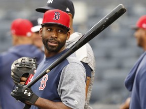 Boston Red Sox center fielder Jackie Bradley Jr. wait his turn to take batting practice after their baseball game against the New York Yankees was postponed due an impending storm, Thursday, May 30, 2019, in New York.