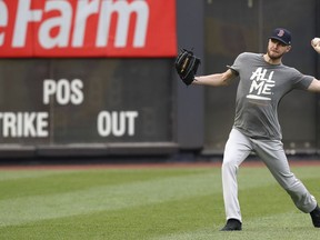 Boston Red Sox starting pitcher Chris Sale throws on the field after the team's baseball game against the New York Yankees was postponed due to rain, Thursday, May 30, 2019, in New York.